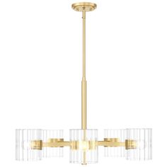 a brass chandelier with clear glass shades