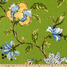 a green background with blue and yellow flowers