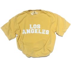 Los Angeles Distressed Tshirt Trendy Tops Comfort Colors Shirt Womens Tshirt Oversized Graphic Tee Retro Shirt California Trendy Tshirt 📦 FREE SHIPPING on orders $35 or more to US shoppers 🛒Our unisex distressed Los Angeles T-Shirts are a soft relaxed/loose fitting t-shirt, perfect for lounging around the house, relaxing, hanging out with friends, festivals or dressing up/down. 👕Brand = Comfort Colors 🧵Fabric = 100% Cotton ✂️Design = Heat-applied vinyl (Distressed vinyl design) 🎨Color = Mus Cheap Yellow Tank Tops, Cheap Relaxed Fit T-shirt, Cheap Tops For College, Cheap Yellow Tops With Funny Print, Cheap Fitted Tie-dye T-shirt, Cheap Fitted T-shirt For College, Cheap Yellow Retro Tops, Cute Cheap Tops For College, Cheap Fun Yellow Tops