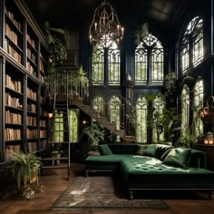 a living room filled with lots of furniture and bookshelves next to a staircase