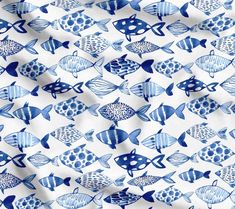 a blue and white fish print fabric