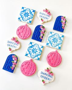 decorated cookies are arranged in the shape of doors