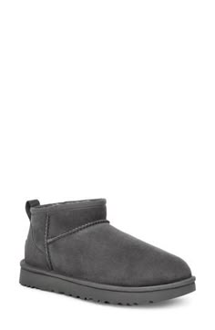 An ultra-short shaft adds a twist to this abbreviated version of a classic UGG boot. The style delivers extra comfort with a lining crafted from UGGplush, a moisture-wicking textile made from a wool-rich blend but crafted to feel and wear like genuine shearling. 1" heel; 3/4" platform (size 11) 3 3/4" shaft Pull-on style Treadlite by UGG outsole is lightweight and flexible Leather upper/genuine shearling and UGGplush wool-blend lining/synthetic sole Shearling may be sourced from Australia, Irela Ultra Mini Ugg, Mini Ugg Boots, Classic Boots Woman, Antelope Shoes, Ugg Chestnut, Ugg Ultra Mini, Ugg Boot, Classic Ugg Boots, Ugg Classic Ultra Mini