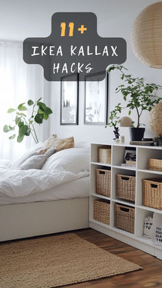 a white bed sitting next to a window filled with plants and wicker bins