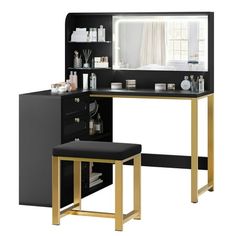 a black and gold vanity with mirror, stool and shelf in front of it on a white background