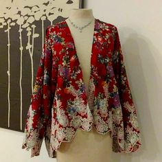 Beautiful Wine Colored, Floral And Embroidered Kimono With Sleeves. The Pattern Is In Greens, Blues, Gold, Ivory. Ivory Colored Embroidery. 100% Cotton. Dress Up Any Dress, T, Cami With This Beautiful Fall Colored Piece. Necklace Also Available In My Closet. Multicolor Floral Embroidered Kimono For Fall, Fitted Red Kimono For Spring, Red Kimono For Spring Festivals, Red Open Front Top For Spring, Red Open Front Tops For Spring, Spring Red Open Front Top, Fall Multicolor Kimono With Floral Embroidery, Fitted Red Summer Kimono, Spring Festive Red Kimono