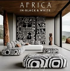 the cover of africa in black and white, with an image of african art on the wall