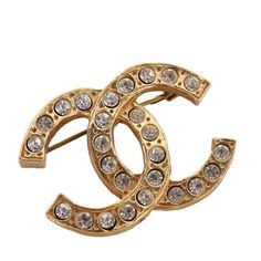 Authentic, pre-owned Chanel rhinestone gold pin brooch. This is a classic vintage brooch by Chanel that you will love! Would make quite the statement on your coat, jacket, blouse, dress or scarf. Made in France Chanel Pins, Jacket Blouse, Gold Pin, Chanel Model, Chanel Jewelry, Rhinestone Designs, Rhinestone Brooches, Vintage Brooch, Vintage Chanel