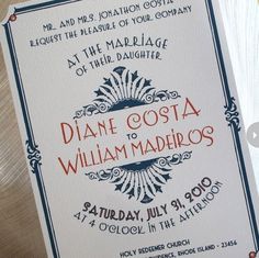 a close up of a wedding card on a table