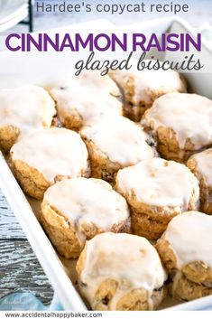 cinnamon raisin glazed biscuits in a white baking dish