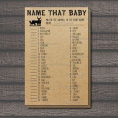 a wooden sign that says name that baby with an image of a moose on it