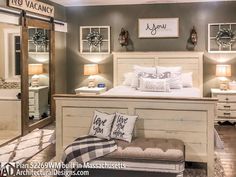 a white bed sitting inside of a bedroom on top of a hard wood floor next to two lamps