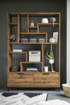 an image of a bookcase with books on it and the text buy 2 save 10 %