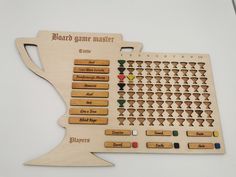 a wooden game board with several different types of numbers and shapes on the back side