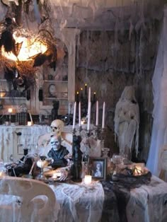 a dining room decorated for halloween with ghost decorations