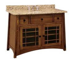 a bathroom vanity with marble top and drawers