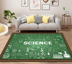 a living room with a green rug that says science on it