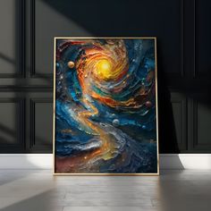 an abstract painting in a room with dark walls and flooring, it looks like the sun