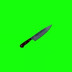 a large knife on a green screen