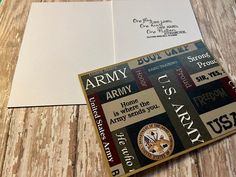 an open army greeting card on top of a wooden table