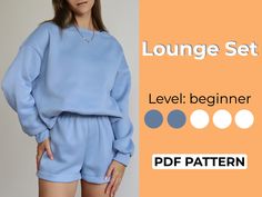 a woman in blue shorts and a sweater with the text lounge set level beginner