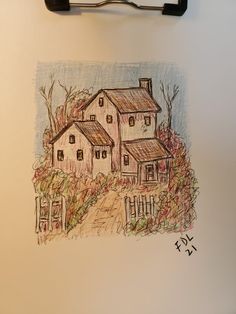 a drawing of a house on the wall