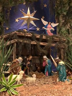 a nativity scene with the birth of jesus