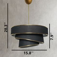 a large black and gold chandelier hanging from a ceiling with measurements for the length