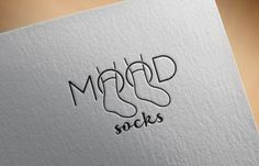 the logo for marcd socks is drawn on a piece of paper