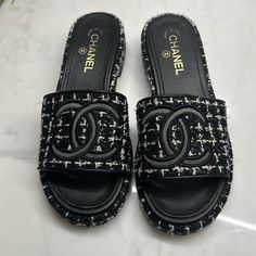 Guaranteed Authentic!! Very Rare Chanel Black And White Tweed Sandal Slides With Pops Of Colored Stitching Throughout. From 2020 Worn 2-3 Times. Very Comfortable And True To Size! Sandal Slides, Chanel Black And White, Shoes Chanel, Chanel Tweed, Black And White Tweed, White Tweed, Chanel Black, Chanel Shoes, American Design