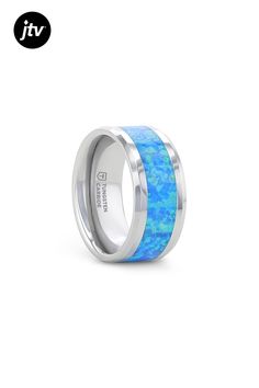 QUASAR Tungsten Wedding Band with Blue Green Opal Inlay  This exotic and finely polished Tungsten Carbide ring features an inlay of sparkling laboratory grown blue/green opal.  Tungsten Carbide���the newest and strongest metal for jewelry that does not scratch easily. Please note, opal inlay is made of a softer material and can scratch. Comfort Fit ��� domed interior band slides over the knuckle easier with less friction. Ring Spacer, Tungsten Wedding Band, School Jewelry, Tungsten Carbide Rings, Tungsten Wedding Bands, Popular Jewelry, Green Opal, Tungsten Carbide, Womens Glasses