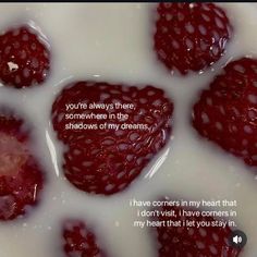 some strawberries are floating in milk with the words you're always there, somewhere in the shadows of my dreams