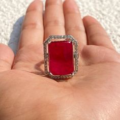 Ruby Diamond Ring features doublet stone surrounded by CZ diamonds. Perfect for any special occasions. These Statement Cocktail Ring will surely elevate your whole look. Perfect for bride gift or gift for mom. *𝐏𝐑𝐎𝐃𝐔𝐂𝐓 𝐃𝐄𝐓𝐀𝐈𝐋* * 𝐌𝐚𝐭𝐞𝐫𝐢𝐚𝐥: Brass * 𝐏𝐥𝐚𝐭𝐢𝐧𝐠: White Rhodium Plated * 𝐒𝐭𝐨𝐧𝐞: AAA-quality CZ Diamond & Ruby. 𝐕𝐢𝐬𝐢𝐭 𝐎𝐮𝐫 𝐅𝐀𝐐𝐬 𝐟𝐨𝐫 𝐒𝐡𝐢𝐩𝐩𝐢𝐧𝐠 𝐏𝐨𝐥𝐢𝐜𝐢𝐞𝐬 𝐚𝐧𝐝 𝐂𝐚𝐫𝐞 𝐈𝐧𝐬𝐭𝐫𝐮𝐜𝐭𝐢𝐨𝐧 *𝐃𝐈𝐒𝐂𝐋𝐀𝐈𝐌𝐄𝐑* * Product color may slightly vary due to photographic lighting sources or your screen settings. * Stone color may vary slightly due to variations in natural stones. *𝐒𝐈𝐌𝐈𝐋𝐀𝐑 𝐃𝐄𝐒𝐈𝐆𝐍* https://www.etsy.com/listing/1756908147/ Elegant Ruby Ring With Diamond Settings, Ruby Jewelry With Diamond Accents, Emerald Cut, Emerald Cut Ruby Jewelry With Diamond Accents, Dazzling Ruby Ring With Diamond Accents, Red Diamond Ring With Accents, Dazzling Red Ring With Accent Stones, Red Emerald-cut Diamond Accented Jewelry, Dazzling Red Diamond Ring With Accents, Dazzling Red Diamond Ring With Diamond Accents