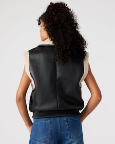 Stay warm and chic with the AVI Leather Sherpa Black VEST by Steve Madden. Made with cozy shearling and featuring functional pockets and a neck buckle decoration, this vest is the ultimate combination of style and practicality. A must-have for any winter wardrobe! 100% Polyurethane Wipe Clean Cold Weather Outfit, Closed Toe Heels, Bodysuit Jumpsuit, Shearling Vest, Tank Bodysuit, Black Vest, Wedge Boots, Sweater Blouse, Sneakers For Sale