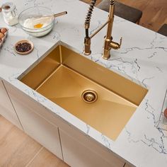 a kitchen sink sitting on top of a counter