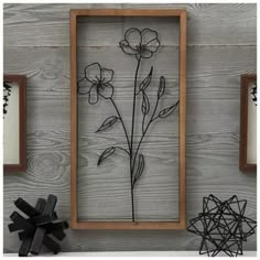 Dimensions: 20" H x 10.5" W x 1.31" D Material: MDF & Metal Shape: Rectangle Color: Black & Brown Orientation: Vertical Includes: 1 Sawtooth Hanger Quantity: 1 Decorate your home with classy, country-chic accents like this Black Wire Flower Wood Wall Decor. This industrial style piece features a black wire flower sculpture held in a brown MDF frame. The combination of dark, neutral colors and natural elements makes this charming piece a good fit for an industrial or modern farmhouse home. Display it in your living room, bedroom, or office! Small Wall Decoration, Black Theme Home Decor, Black White Boho Decor, Rustic Modern Office Decor, Black And Neutral Home Decor, Wall Decor Between Two Windows, Black Wall Decor Living Room, Behind The Sofa Wall Decor, Small Entryway Wall Decor