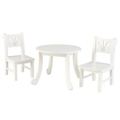 a white table and two chairs sitting next to each other