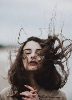 a woman with her hair blowing in the wind and a quote from joyce mayer on it