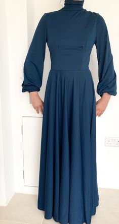 This is an exceptional vintage maxi dress from the 70's, a truly striking piece. Very well made and very flattering.  Era: 70's  No brand, no label  Blue Jersey  Zip at the back  High collar  Condition: In very good condition ( there is a hardly visible mark on the bottom part of the dress, see picture)  Measurements:  Shoulders from seam to seam: 38 cm  Underarm to underarm: 43 cm  Waist: 33 cm  Hips: free  Length: 146 cm  Would fit a S to M  The model is a U.K. 10 and 5ft7 tall Please bear in mind that this is a vintage item that had a previous lifetime or even several.  I take extra care in describing the item accurately, the colours of the item on the pictures may vary very slightly  from phone to computer to reality.  I am happy to answer any queries. Blue Evening Dress, Exhibit Ideas, Blue Evening Dresses, Blue Jersey, Royal Outfits, Vintage Maxi Dress, Maxi Robes, Pretty Clothes, Dress Clothes For Women