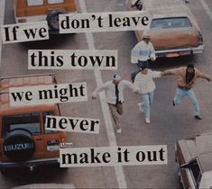 an image of people crossing the street in front of cars