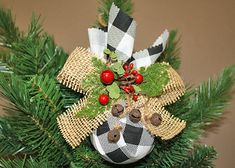 a christmas ornament hanging from a tree