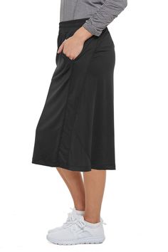 Travel Skirt 26 Black by Snoga Athletics Black Tennis Skirt With Pockets For Summer, Black Summer Tennis Skirt With Pockets, Casual Go-dry 4-way Stretch Tennis Skirt, Black Tennis Skirt With Pockets For Sports, Casual Knee-length Tennis Skirt For Summer, Casual Knee-length Summer Tennis Skirt, Sporty Skirted Bottoms With Pockets, Casual Stretch Skort With Pockets, Sports Skirted Bottoms With Pockets