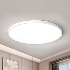 a white ceiling light in a living room