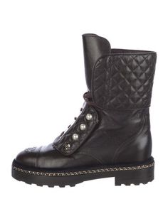 Chanel Leather Mid-Calf Combat BootsFrom the 2017 Collection by Karl LagerfeldBrownInterlocking CC Logo, Faux Pearl Accents & Quilted PatternRound-Toes with Chain-Link AccentsStraps & Lace-Up Closure at UppersIncludes Box & Dust BagFit: This style typically runs a full size small.Unfortunately, due to restrictions, this item may not be eligible for shipping in all areas. Combat Boot Chanel, Chanel Combat Boots 2022, Chanel Boots Combat, Chanel Lace Up Boots, Chanel 2017, Cc Logo, Boot Shoes Women, Mid Calf, Chain Link