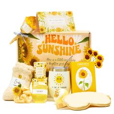 the hello sunshine hamper is packed with sunflowers, cookies and other items