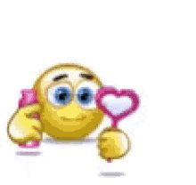 an emoticive smiley face holding a pink heart