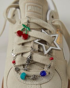 Free People | Your sneakers deserve a little love. Link in bio to shop shoe charms. | Instagram Lace Charms, Shop Shoe, Dope Jewelry Accessories, Diy Sneakers, Pretty Shoes Sneakers, Lace Decor, Post Instagram, Sneaker Jewelry, Aesthetic Shoes