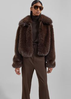 Color: Brown Heavyweight smooth faux fur Regular fit Exaggerated wide collar Side seam pockets Elasticated cuffs Front zip closure Satin lining 100% Polyester Dry Clean By The Frankie Shop Faux Fur Coat Plus Size, Mens Cold Weather Fashion, Fur Coat Street Style, Cosy Outfits, Brown Fur Coat, 2025 Christmas, Fur Jacket Women, Zara Winter