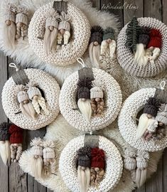 knitted ornaments are arranged in the shape of angels