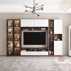 a living room with an entertainment center and large screen tv on the wall in front of it